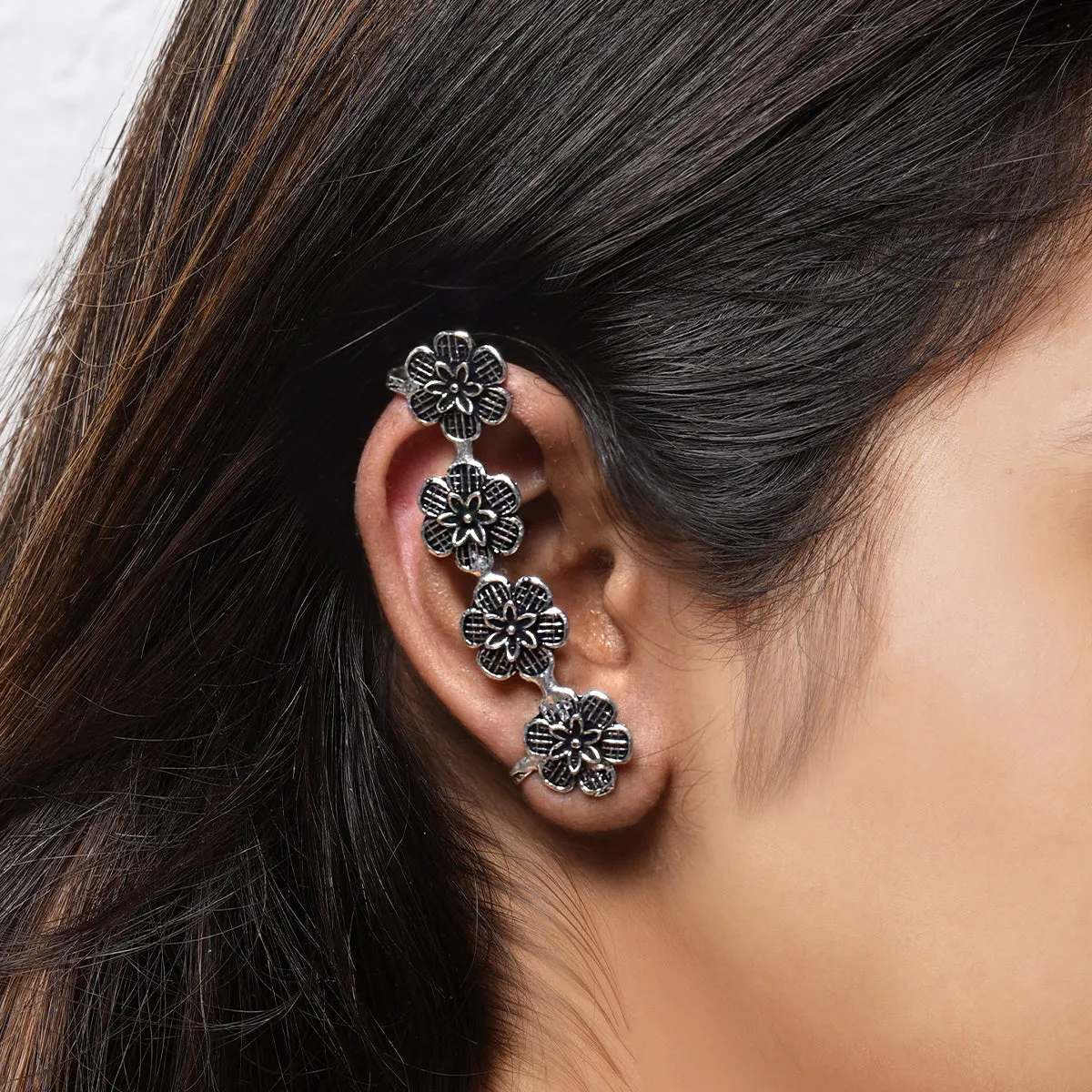 Teejh Dipanshu Silver Oxidised Floral Earcuffs